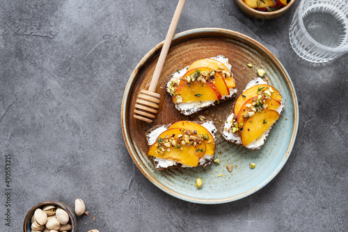Canvas Print Peach and cream cheese breakfast toast