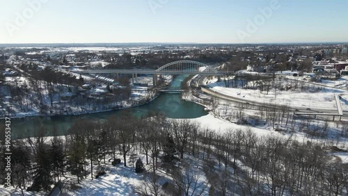 Blue Sky Day flyover of suburban neighborhood toward Burgoyne Bridge, St. Catharines, Ontario Canada photo