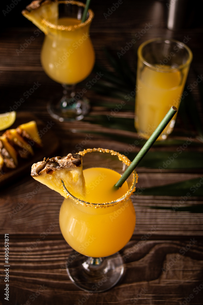 Pineapple cocktail. Summer refreshing tropical drink with pineapple juice and tequila.
