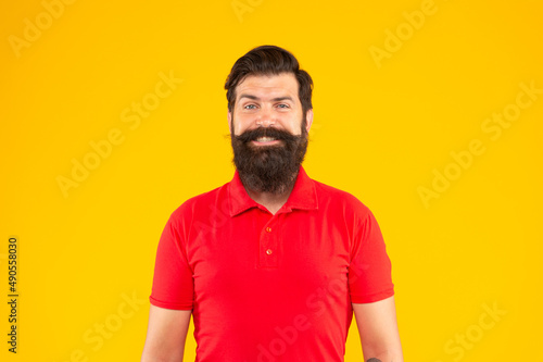 brutal caucasian guy with moustache. confident and handsome bearded man