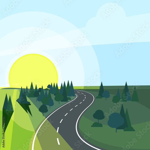 Countryside landscape with road going to rising sun