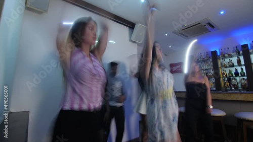 A group of friends dancing and enjoying their time at Bay 15, Goa. photo