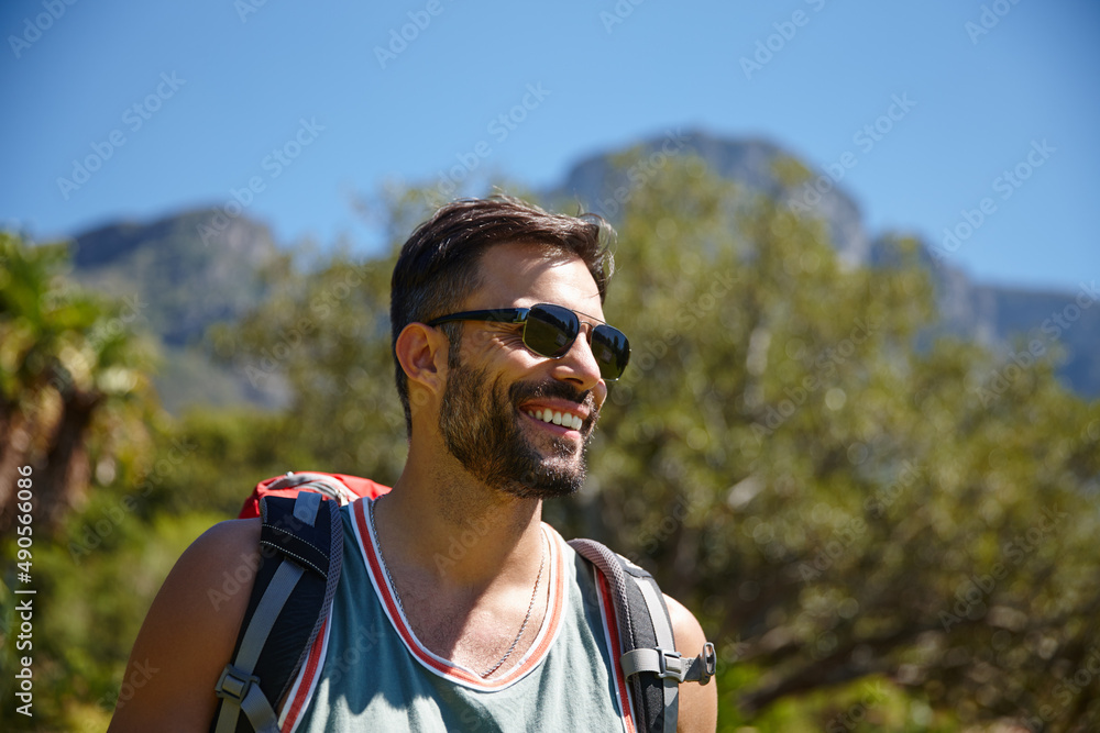 Getting away from it all. A hiker with a backpack on his back. Getting away from it all. A hiker with a backpack on his back.