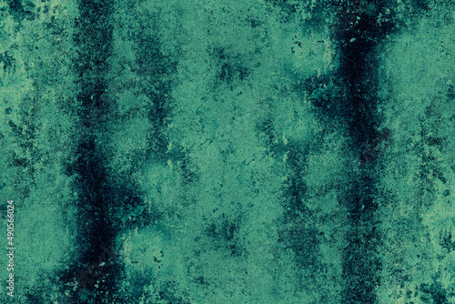 Grunge textured abandoned green wall surface for background