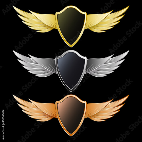 Set gold, silver and bronze shield with wings realistic emblem isolated