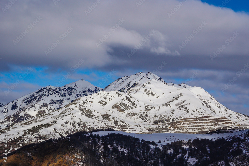 France, Ariege, Mountains Pyrenees, winter sports scene, skiers on the slopes, High quality 4k footage