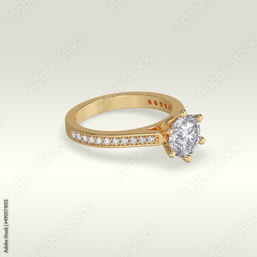 Fotografie solitaire engagement ring laying down position in yellow gold 3D render