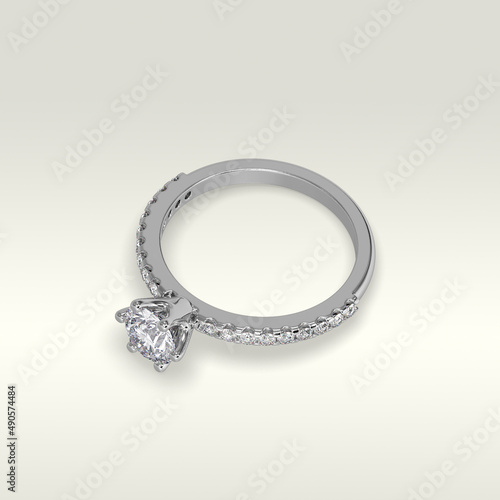 solitaire engagement ring laying down position in white gold 3D render