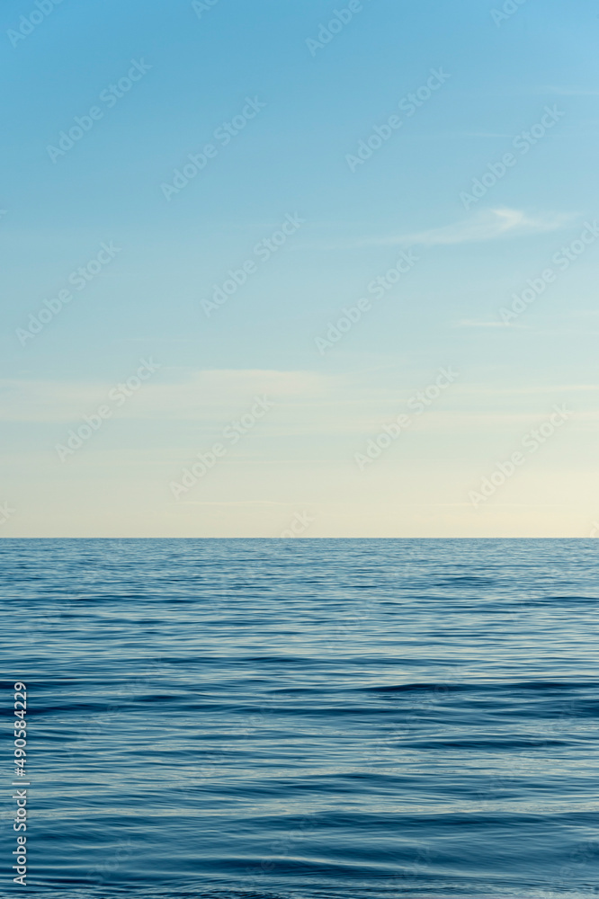 clear sky and calm sea or ocean water surface background