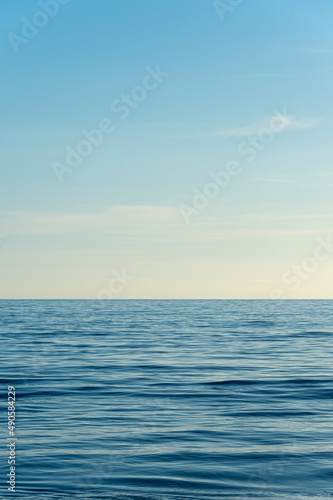clear sky and calm sea or ocean water surface background