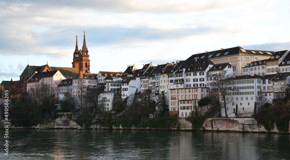 Old buildings on the riverside during sunset in Basel, Switzerland