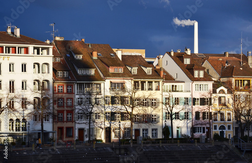 Old buildings on the riverside during sunset in Basel, Switzerland