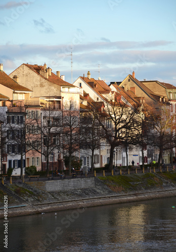 Old buildings on the riverside during sunset in Basel, Switzerland