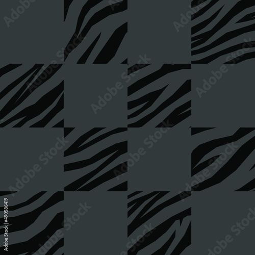 Checkered animal print pattern. Vector seamless pattern