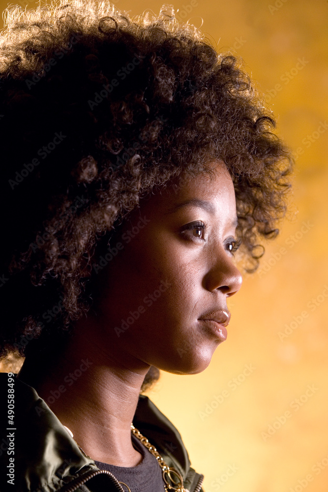 Portrait of African woman with afro Portrait of African woman with afro
