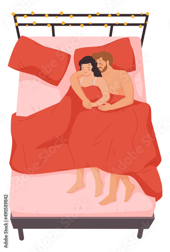 Couple hugging in bed. Romantic scene. Sexual relationship