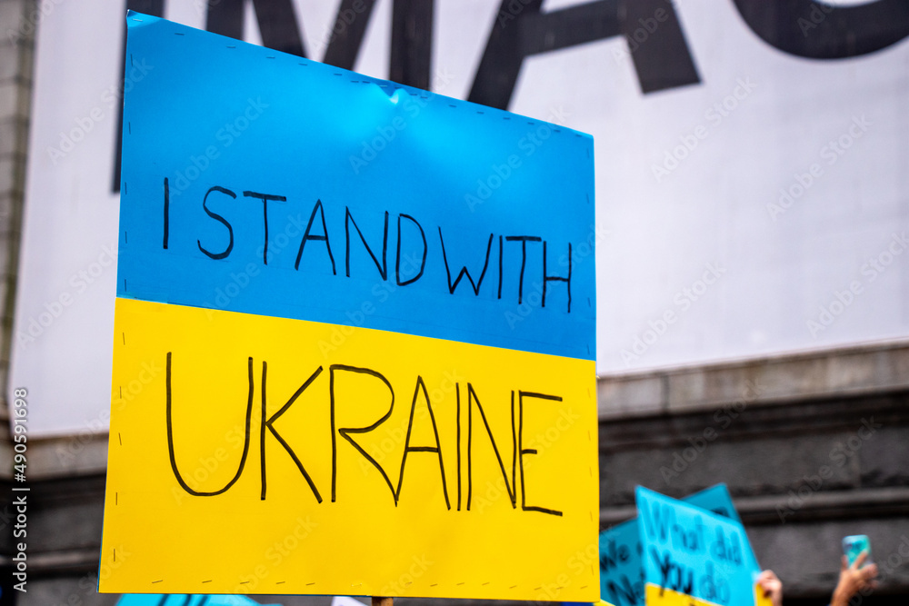 Fototapeta premium View of sign I stand with Ukraine during the rally against invasion of Ukraine in front of Vancouver Art Gallery