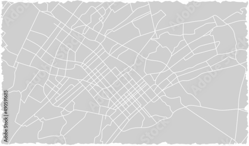 Fragment of the paper city map. Piece of town streets, line drawing. Downtown navigation plan. Abstract scheme town, white line road on gray background. Urban texture. Vector background
