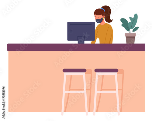 Woman working at reception desk in face protective mask