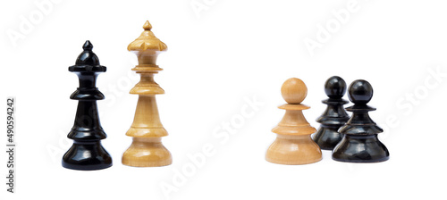 Old chess pieces isolated on white background