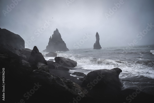 black, wild and rocky beach in iceland