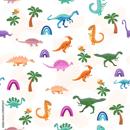 Fototapeta Naklejka Na Ścianę i Meble -  Hand drawn cute dinosaurs seamless pattern. Childrens pattern with dinos, rainbows, clouds, stars, polka dots