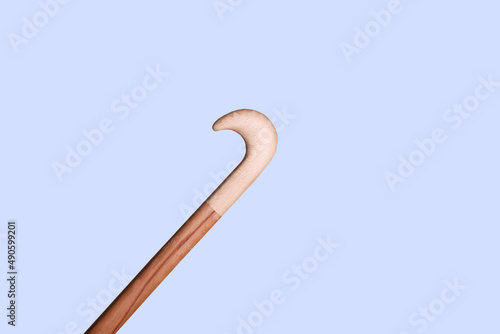 wooden spoon for handmade shoes on a white background, there is a place for writing