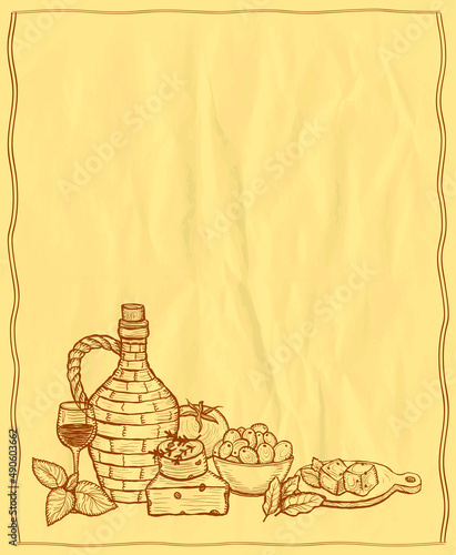 Empty board with frame and mediterranean traditional food ingredients - olives, bottle of wine, vegetables