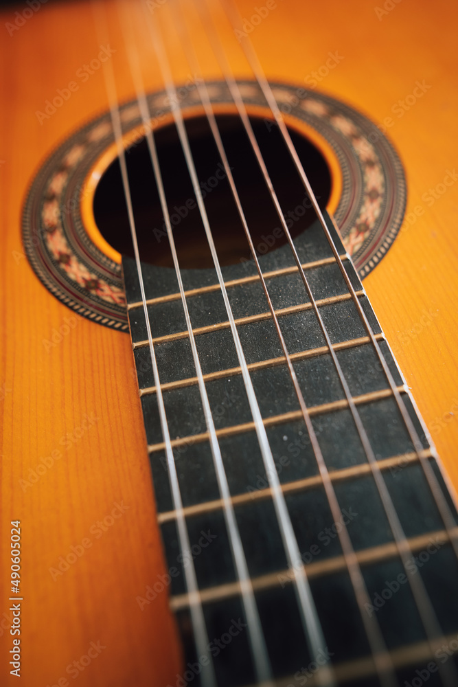Wooden classical guitar, with plastic strings Wooden classical guitar, with plastic strings
