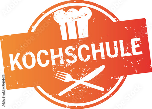Oranger Button Kochschule zerkratzt