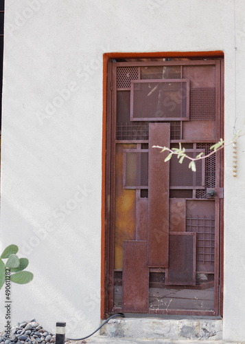 door with flowers in the garden