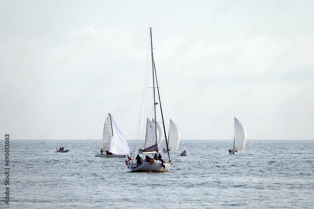 Obraz premium Sailing boats at sea. Sailboat management.