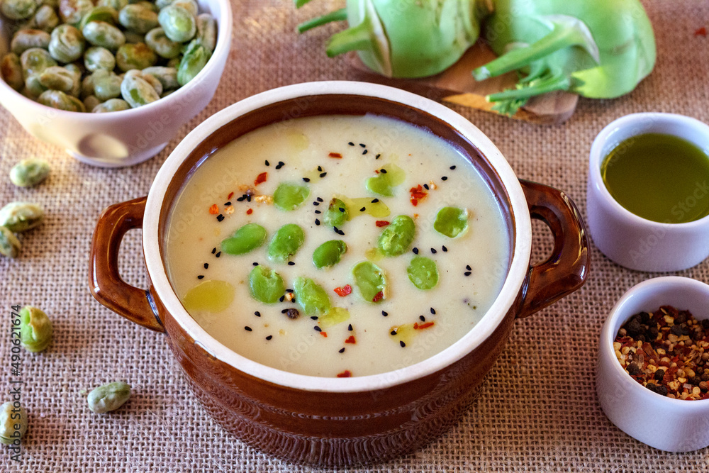 Kohlrabi cream soup with fried broad beans. A healthy vegetarian meal
Kohlrabi cream soup with fried broad beans. A healthy vegetarian meal