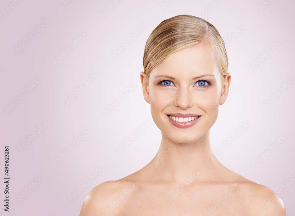 Picture perfect beauty. A gorgeous young woman smiling at the camera. Picture perfect beauty. A gorgeous young woman smiling at the camera.