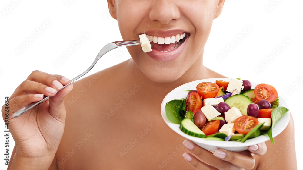 Sticking to a salad today. Cropped studio shot of a woman eating a salad against a white background. Sticking to a salad today. Cropped studio shot of a woman eating a salad against a white background.