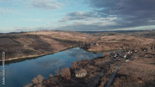 Wide, epic, aerial shot of lake Cincis in Romania photo