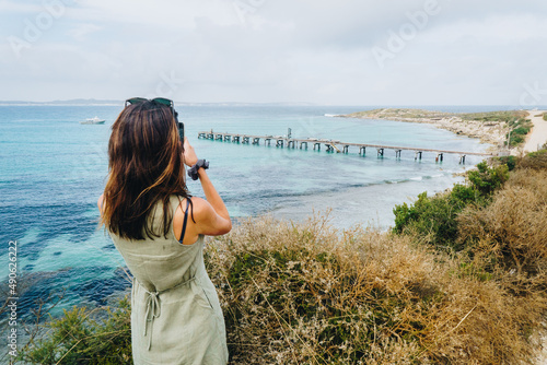 Woman taking photo of Vivonne Bay Jetty on kangaroo Island, South Australia