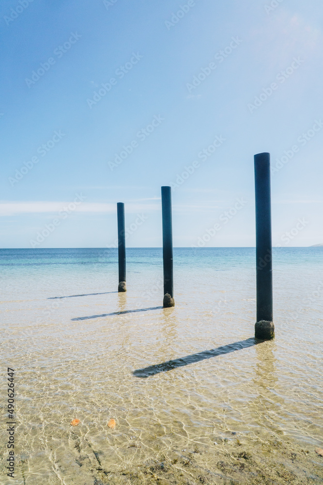 Boat ramp poles at Baudin beach in Kangaroo Island, South Australia