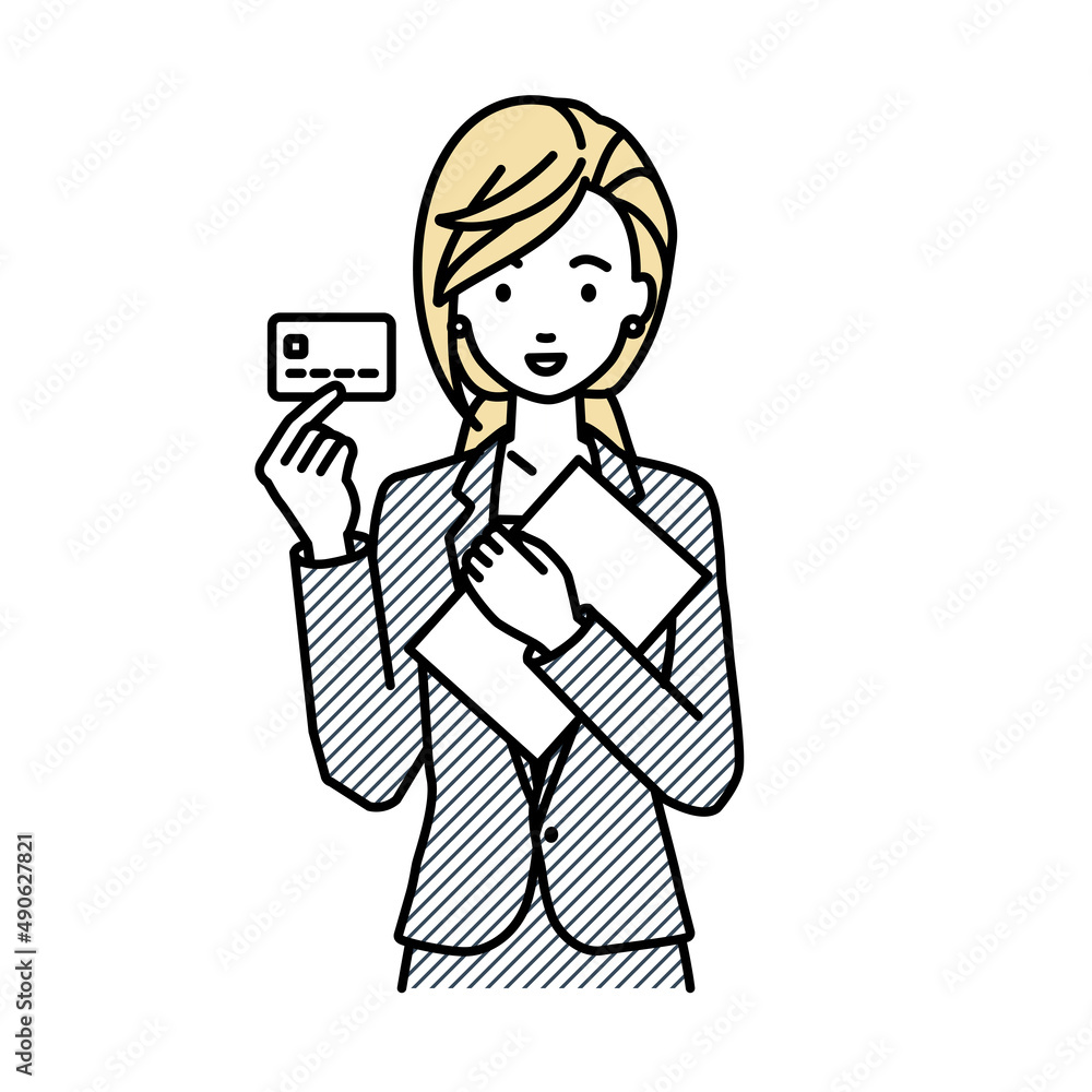 立って書類とカードを手に持つスーツの女性 立って書類とカードを手に持つスーツの女性