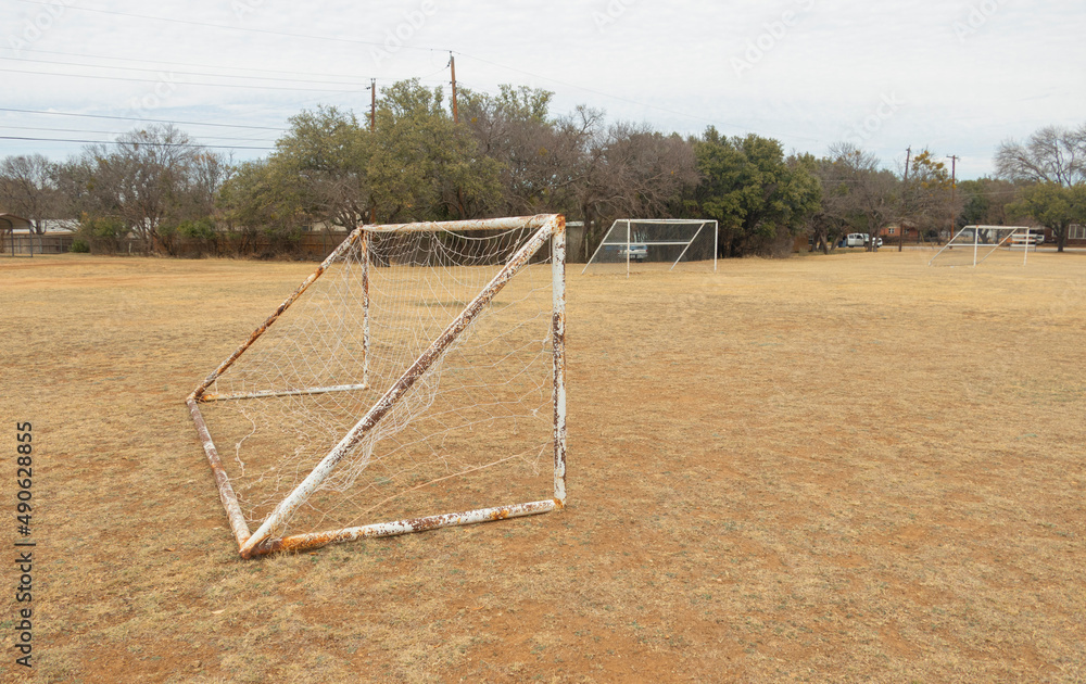 net soccer goal football, winter season, brown grass.