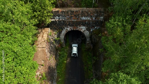 Aerial view of the car entering the tunnel