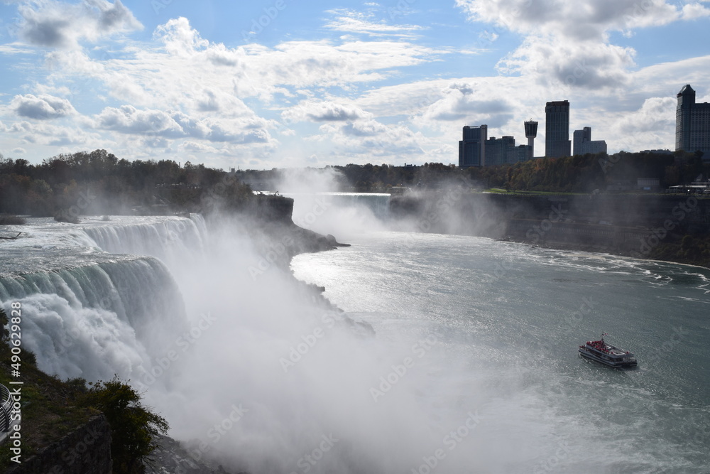 Niagara Falls with maid o the mist and Toronto skyline Niagara Falls with maid o the mist and Toronto skyline
