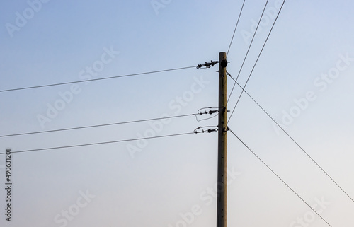 Wallpaper Mural Single electricity transmission pole under the evening sky with copy space Torontodigital.ca