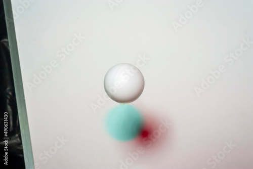 White plastic ball on white background