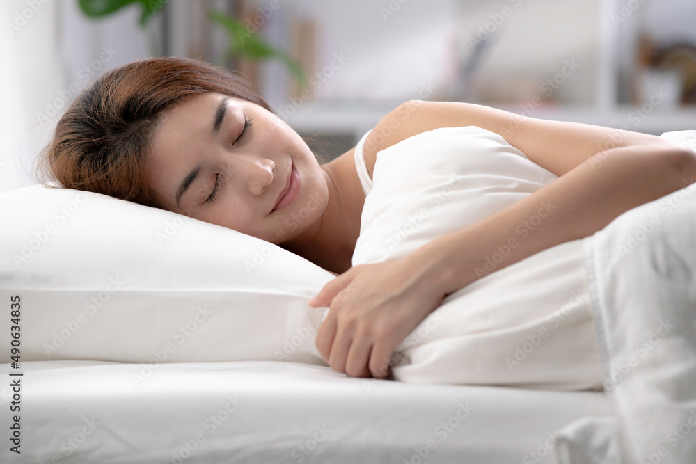 Beautiful Asian woman sleep and sweet dream on bed in bedroom in the morning feeling so relax and comfortable. Beautiful Asian woman sleep and sweet dream on bed in bedroom in the morning feeling so relax and comfortable.