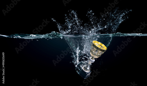 Trophey cup in water . Mixed media