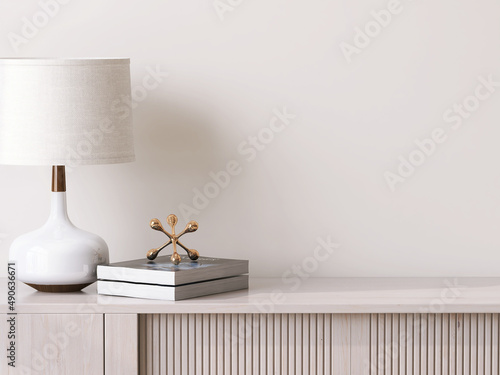 Modern design sideboard top with space, lamp, books in morning sunlight in living room with beige wall. 3D render of product display background, backdrop for home appliances, luxury lifestyle product. photo