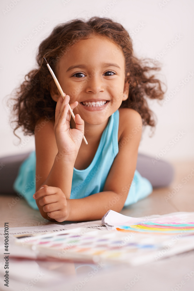 Rainbows are my favorite thing in the whole world. Shot of a little girl painting a picture of a rainbow. Rainbows are my favorite thing in the whole world. Shot of a little girl painting a picture of a rainbow.