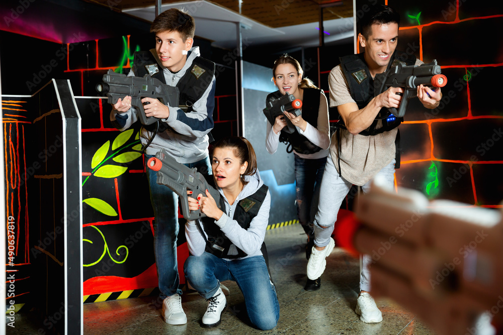 An Image Of A Young Boy Girl Team Playing Laser Tag Game Isolated