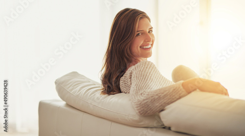 Today is going to be a great day. Shot of a young woman relaxing on her sofa at home. Free Download Today is going to be a great day. Shot of a young woman relaxing on her sofa at home. - GFXLoad